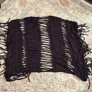 Black swim cover up with cutouts and fringe